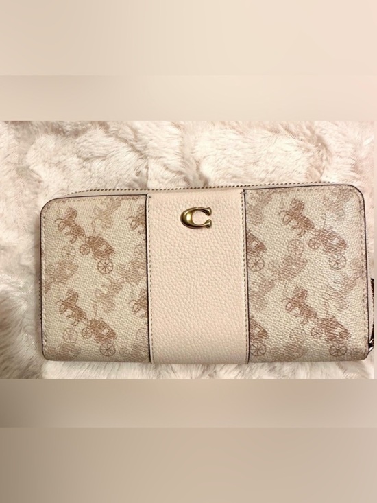 Coach Handbags - Coach beige horse and carriage Signature Convertible wallet with Gold 'C'